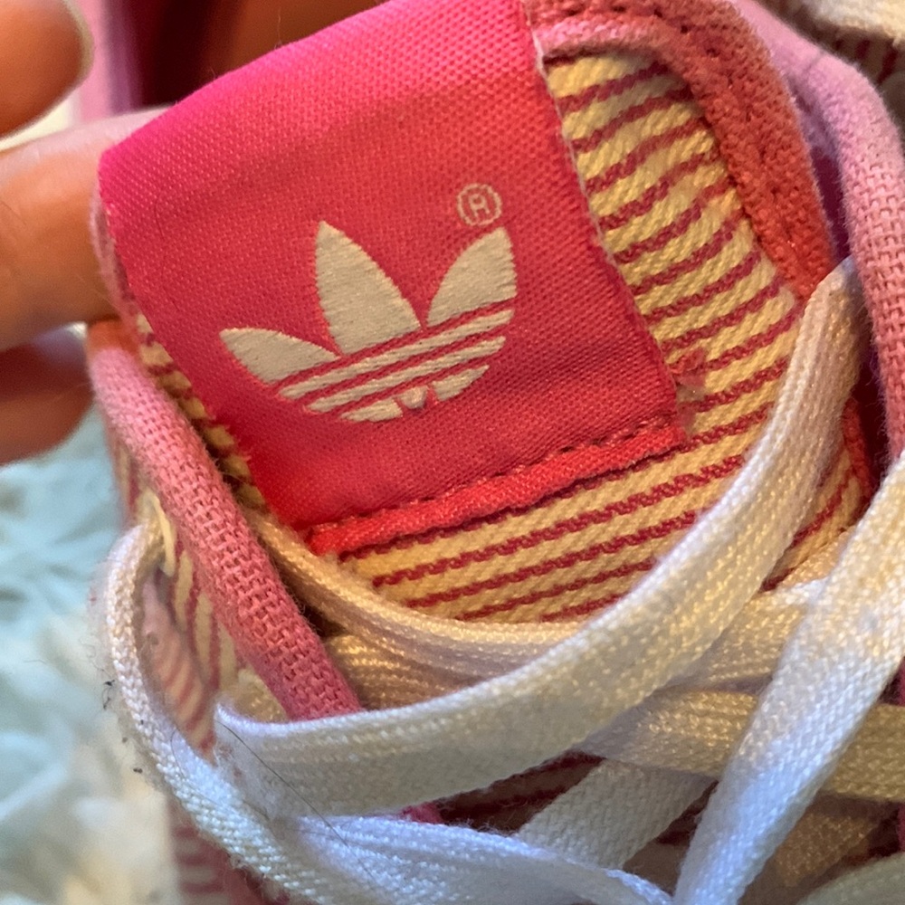 Adidas pink and white striped canvas shoes